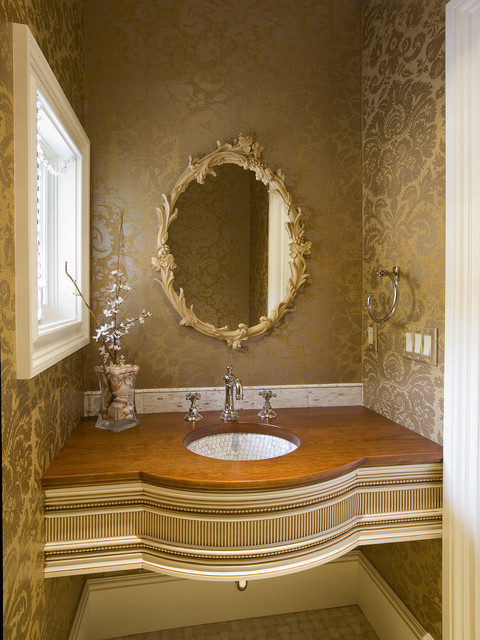 Фотография туалетной комнаты в золотистом цвете